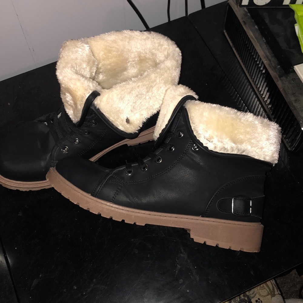 Black and cream faux leather and fur boots.